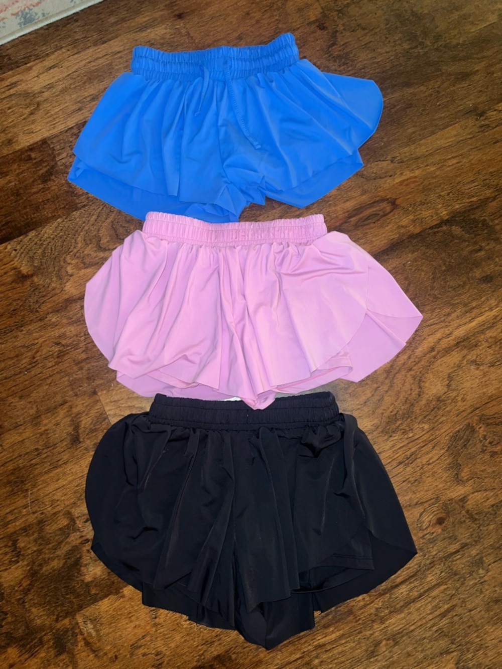 Girls bundle of ‘Butterfly’ shiorts - size 7.  Blue, pink, and black.